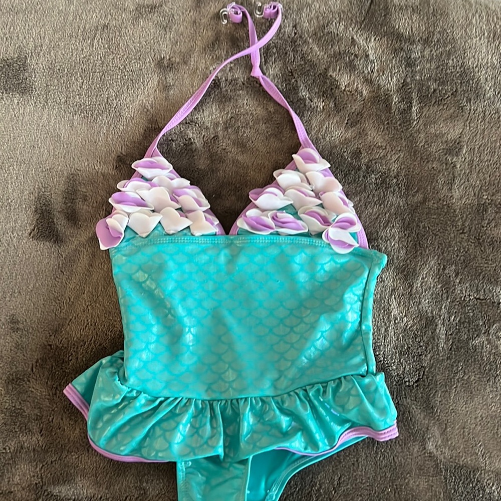 Purple and green mermaid swimsuit with floral top and skirt